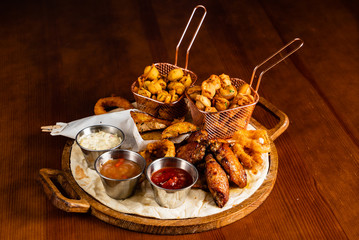 Large beer plate  on the wooden background