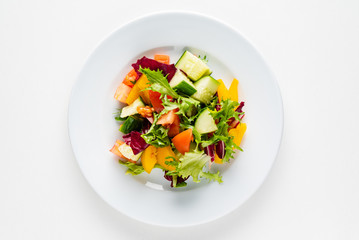 vegetable salad on the white plate