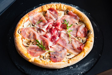 pizza with ham and mushrooms