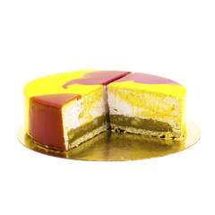 yellow cake with strawberry souffle on a white plate with berries