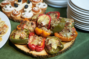 Sweet pepper stuffed with grinded meat, rice, vegetable and cheese
