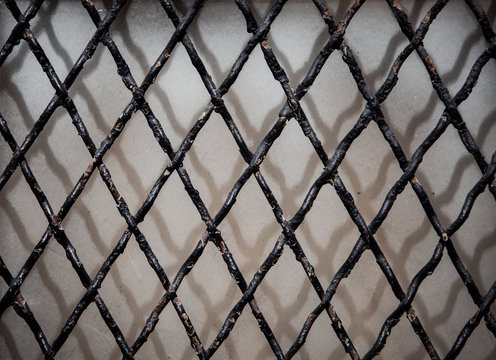 iron chain pattern wire over window background