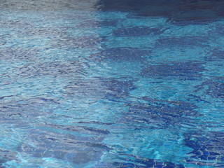 Close up image of water in an outdoor swimming pool
