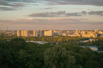 Sunset view of Kiev city from roof at evening. Kyiv, Ukraine