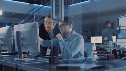 Electronics Development Engineer Uses Personal Computer Talks with Manager, Shows Project Details. Team of Professionals Use Digital Whiteboard with CAD Software for the Industrial Engineering Design - Powered by Adobe