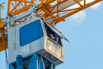 Crane operator takes a siesta