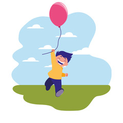 happy boy holding balloon