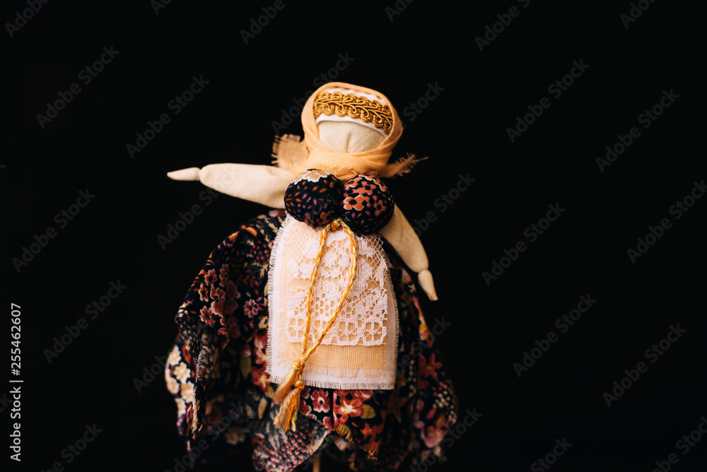 Wall mural Traditional Russian stuffed on pancake week. Straw effigy for the traditional Slavic holiday - Carnival. Homemade dolls with hay for children.