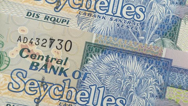 Seychelles currency rupee notes rotating. Seychellois money. 4K stock video footage