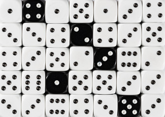 Background of random ordered white dices with five black cubes