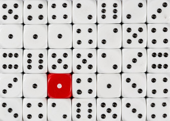 Background of random ordered white dices with one red cube