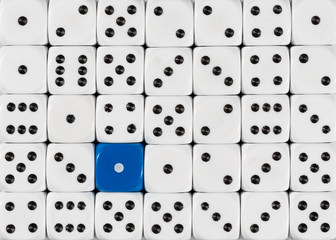 Background of random ordered white dices with one blue cube