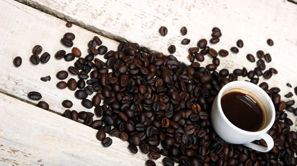 Coffee cup and coffee beans
