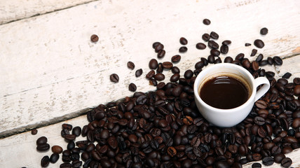 Coffee cup and coffee beans