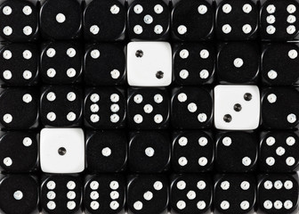Background of random ordered black dices with three white cubes