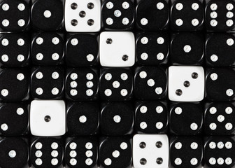 Background of random ordered black dices with five white cubes