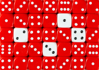 Background of random ordered red dices with four white cubes