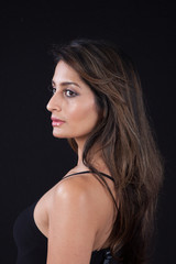 Fototapeta premium Thoughtful woman looking left