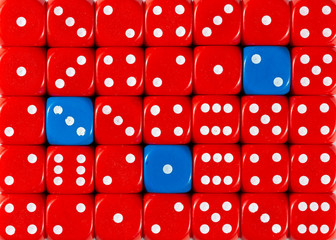 Background of random ordered red dices with three blue cubes
