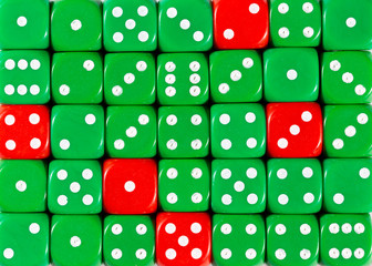 Background of random ordered green dices with five red cubes