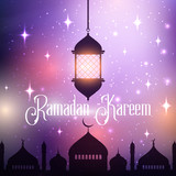 Ramadan Kareem background with hanging lantern and mosque silhouette