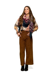 Full-length shot of Young hippie woman posing and laughing looking to the front on isolated white background