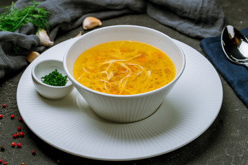 Chicken soup bouillon in a plate