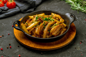 Fried potatoes with mushrooms
