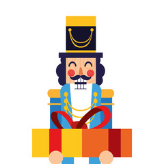 christmas nutcracker holding gift box