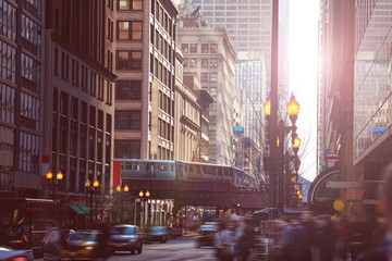 Busy street in Chicago downtown with metro line