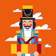 christmas nutcracker holding gift box