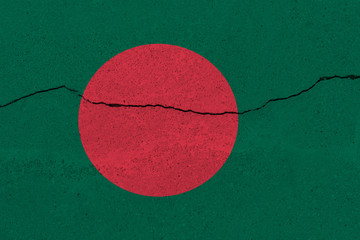 Bangladesh flag on concrete wall with crack