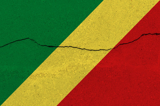 Congo flag on concrete wall with crack © Visual Content