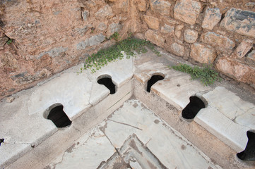 Old type toilets in the ancient city of Ephesus, Aydin, Turkey