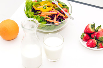 Fresh mixed vegetables salad on table