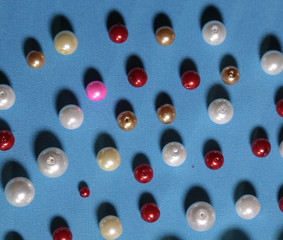 beads on colored background