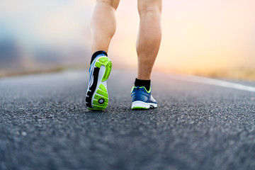 athlete running sport feet on trail healthy lifestyle fitness