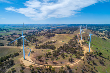 Aerial landscape of wind turbines farm on bright sunny day in New South Wales, Australia