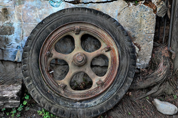 Fototapeta na wymiar Old wheel and tire in Port Costa, California