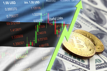 Estonia flag and cryptocurrency growing trend with two bitcoins on dollar bills