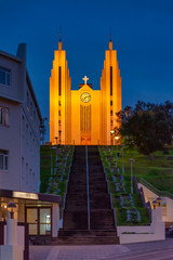 Akureyrarkirkja or The Church of Akureyri is a prominent Lutheran church in Akureyri, northern Iceland. Located in the centre of the city, and towering above the city on a hill. - 255487475