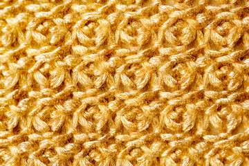 冬物衣類　模様編みのニットのテクスチャ　ゴールドベージュ