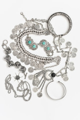 Bohemian style silver jewelry on white