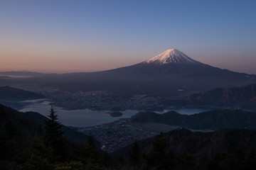 Fototapeta na wymiar Mountain Fuji and Kawaguchiko lake in early morning seen from Shindo toge view point.