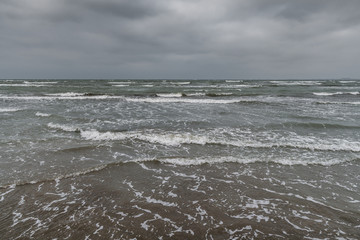 Seascape in cloudy cold weather