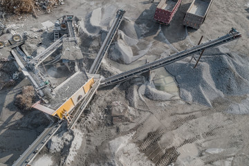 Aerial view of crushed stone quarry machine in a construction material factory 