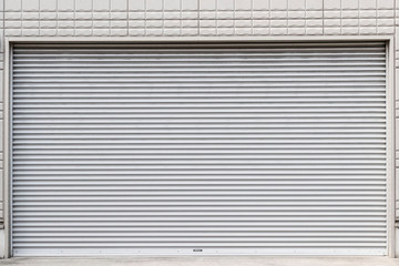 Steel roll doors in front of the store closed