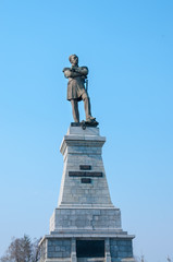 Monument to Count N.N. Muravyov Amursky in the city of Khabarovsk on a background of blue sky
