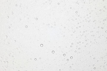 Water drops on glass, Rain droplets on glass background.