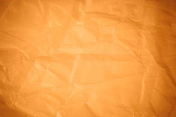 Brown crumpled paper background.